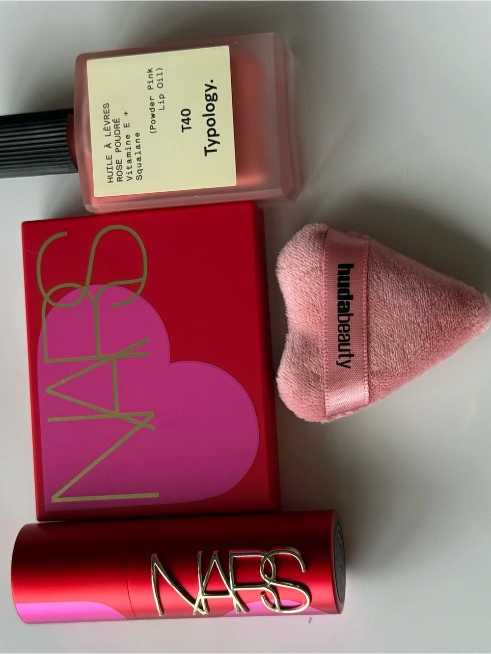 NARS Blush & Lipstick + Typology Lip Oil + Huda Puff